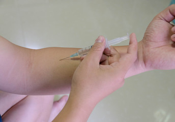 She used the syringe to inject hersalt.Healthcare and Medical concept.