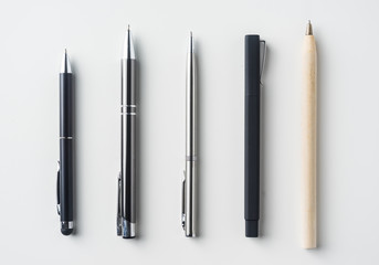 collection of pens on white background