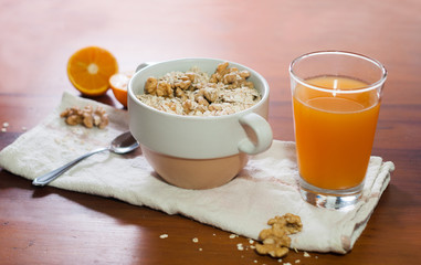 breakfast of nuts,oats and orange juice