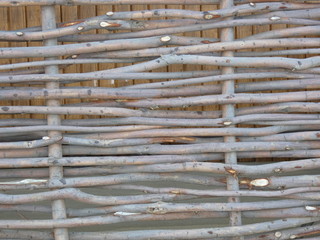 Wooden wattle fence of branchs