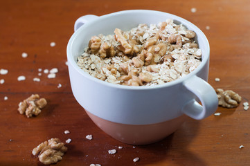 healthy cup of nuts and oats