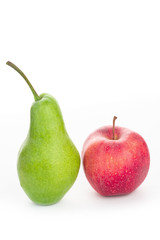 ripe green pears and red apples on a white background