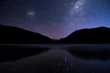 Amazing Starry night at Lake Rotoiti. Reflection of the Milky way and galaxy on the lake. Nelson...