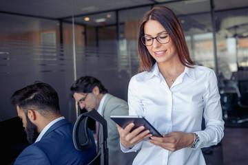 Businesswoman working with tablet