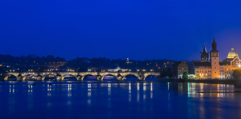 Obraz na płótnie Canvas night view of Charles bridge and Vltava river in Prague, Czech Republic, long exposure