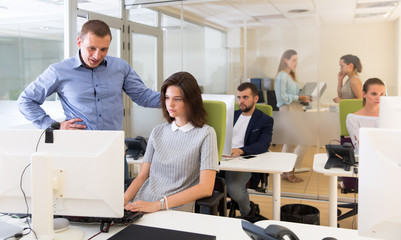 Fototapeta premium Chief executive explaining task to female