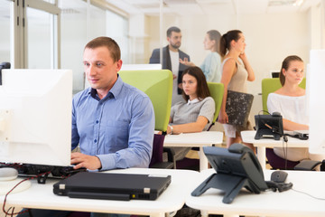Confident businessman work with laptop