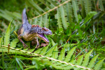 Dinosaur in the jungle background