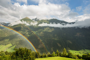 a rainbow in the Alps