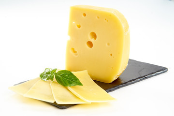 piece of cheese on a black Board