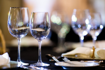 Serving on the table. Crystal glasses