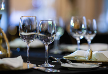 Serving on the table. Crystal glasses
