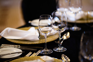 Serving on the table. Crystal glasses