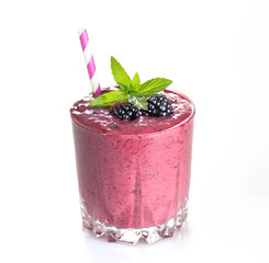 blackberry smoothies juice a tasty healthy drink in a glass, drink the morning on white  background.