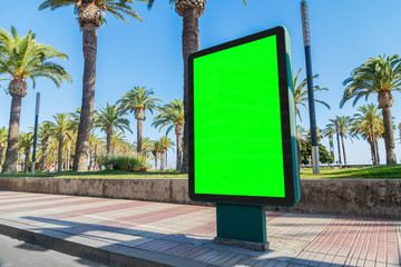 Outdoor billboard advertisement in seaside resort city mockup © sdecoret