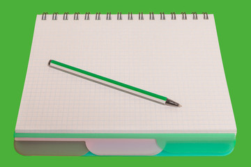 new opened pen lying on notebook with white papers on a green background. back to school concept