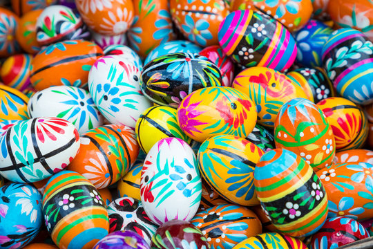 Fototapeta Traditional easter wooden eggs at local market.