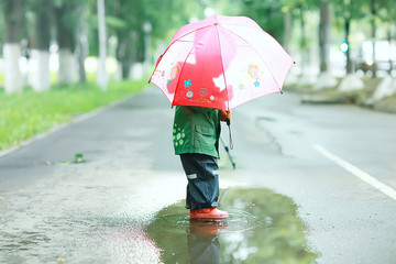 little baby umbrella puddles autumn walk