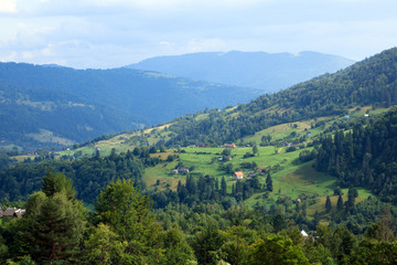 landscape view to the hills with the houses on the top