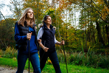 Nordic walking - active people working out in park