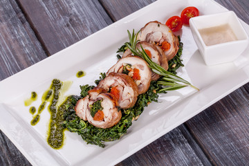 Chicken roulade with spinach, nuts and dried apricots