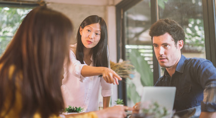 startup business group working at modern office.business people discussing ideas in the office teamwork brainstorming meeting concept