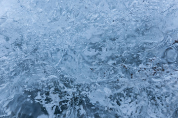 Blue ice texture, winter background, texture of ice surface.