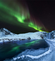 Aurora borealis, northern lights in Iceland during winter. - obrazy, fototapety, plakaty
