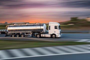 Obraz na płótnie Canvas Tank truck on road, cargo transportation concept.