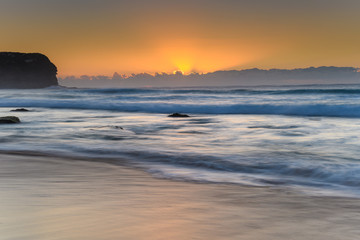 Fototapeta na wymiar Sunrise by the Sea
