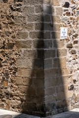 Typical narrow street of the old town of Caceres, Spain
