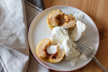  Delicious breakfast in a rustic style. Snack from apples. Baked apples with creamy ice cream