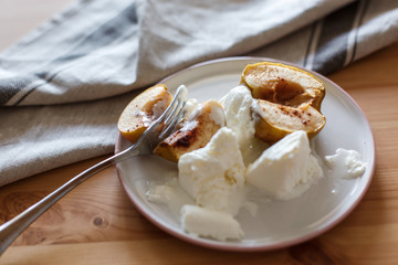  Delicious breakfast in a rustic style. Snack from apples. Baked apples with creamy ice cream