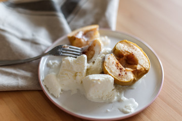  Delicious breakfast in a rustic style. Snack from apples. Baked apples with creamy ice cream