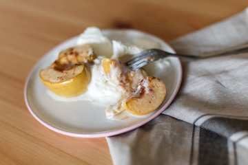  Delicious breakfast in a rustic style. Snack from apples. Baked apples with creamy ice cream