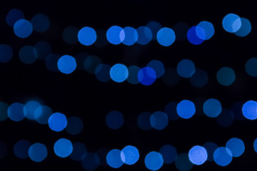 Blurred abstract bokeh background. Blue lights