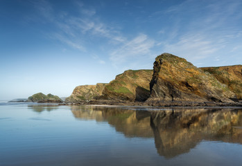 Fototapeta na wymiar Reflections, Whipsiderry Beach, Cornwall