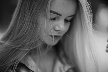 Young girl in autumn portrait, blond adult