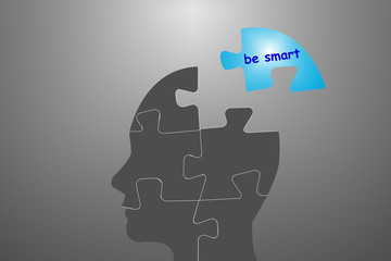 Be smart abstract vector of silhouette of man's head of puzzles. Can be used as a banner, print on t-shirt etc.