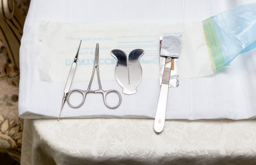 Tools for circumcision. Scissors. knife. And protector