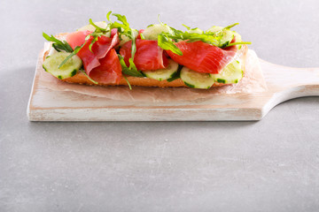 Salmon, cucumber, rocket and creamcheese sandwich