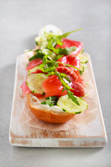 Salmon, cucumber, rocket and creamcheese sandwich
