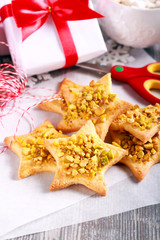 Crunchy pistachio christmas star biscuits