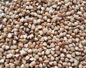 Roasted buckwheat macro top view background