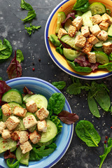 Fried Tofu Salad with Cucumbers, Sesame Seeds and green vegetables