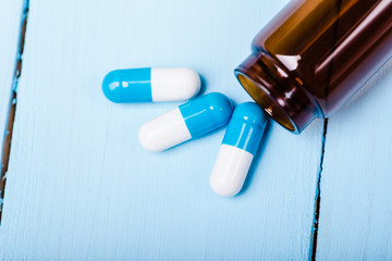 Medicine green and yellow pills or capsules