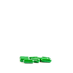 Medicine green and yellow pills or capsules