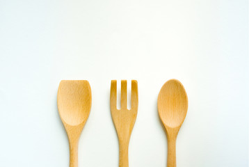 wood ladle and wood fork  isolated on white background. wood spoon and wood fork  of kitchen equipment 