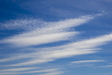 Naklejka na ściany i meble Blue sky and beautiful clouds, nature background