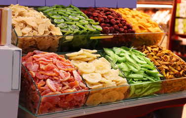 Assortment of delicious dried fruits at market